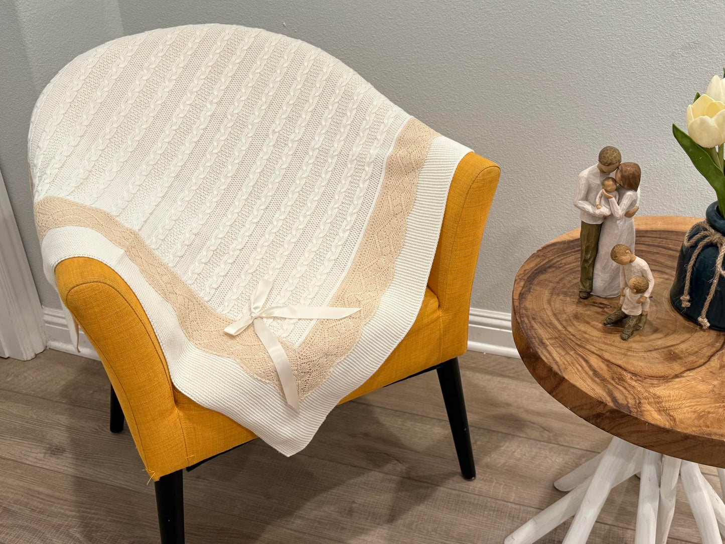 Elegant Knit Baby Blanket with Braided Design and Lace Trim